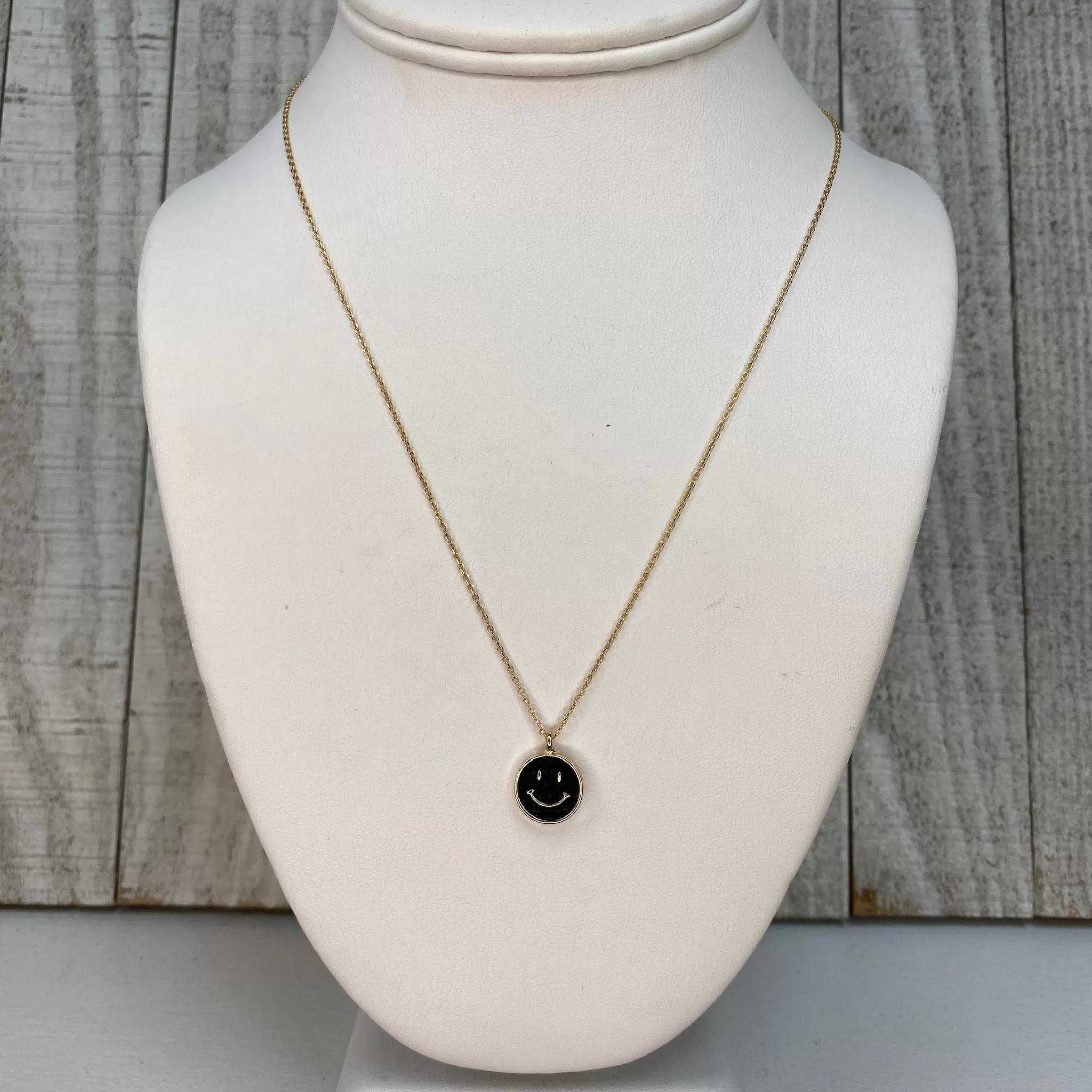 BLACK ENAMEL SMILEY FACE NECKLACE